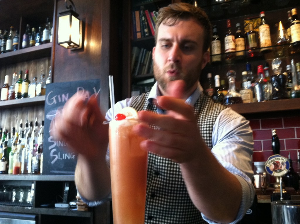 Simon working his magic and creating a Singapore Sling.